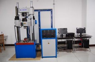 Microprocessor-controlled electro-hydraulic servo testing machine